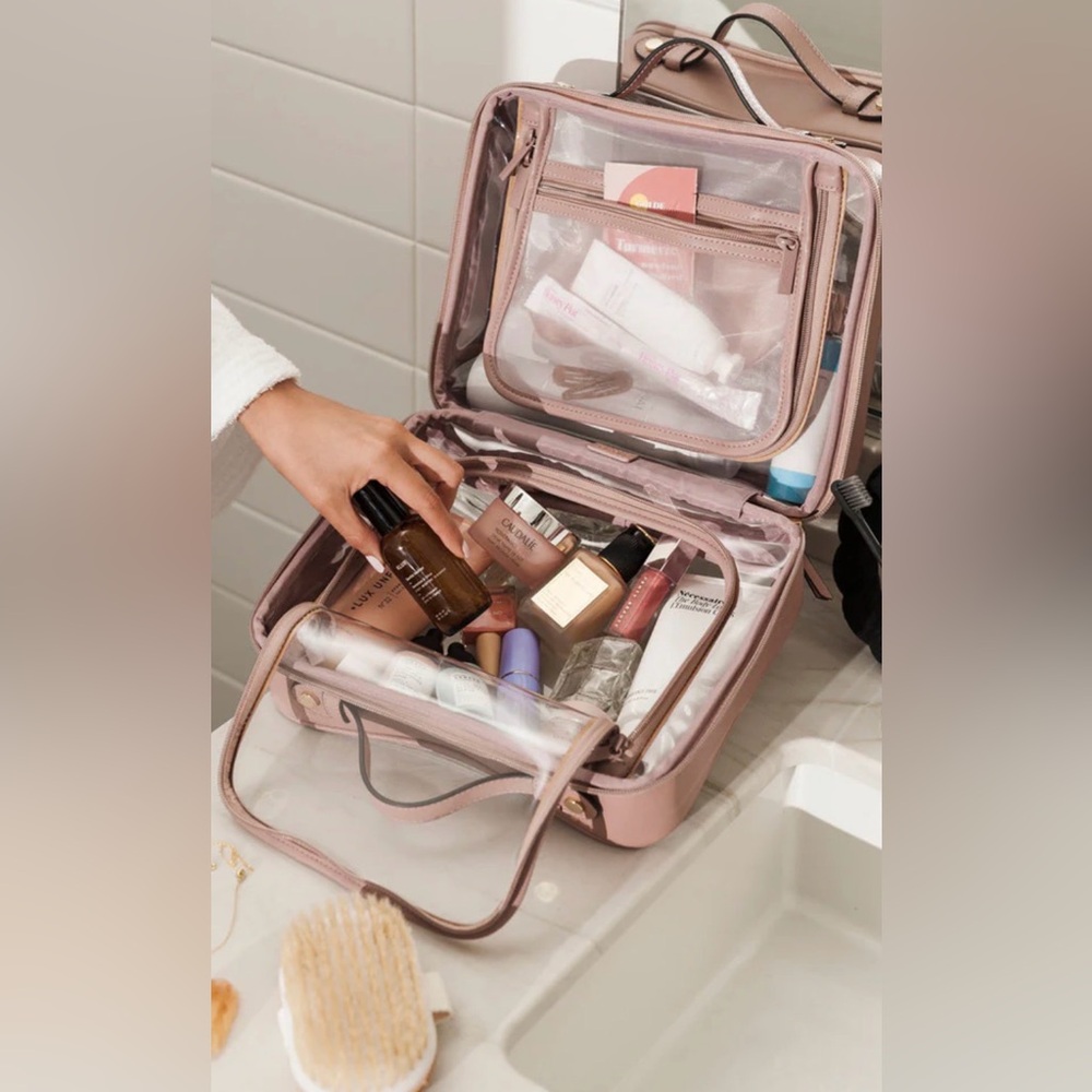 CalPak clear cosmetic case in mauve. Large